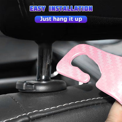 4 Pack 4.13 Inch Carbon Fiber Car Seat Headrest Hooks, Pink | plastic body, supports up to 55 lb, tool-free post fit, rotates beneath headrest when idle, interior storage accessory - Image 3