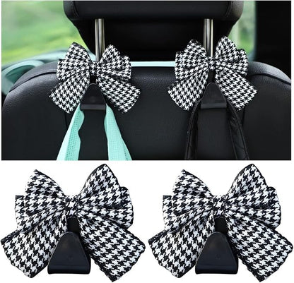 Mandark 2PCS Bow Car Headrest Hooks for Bags, Black/White Line | PVC construction, clip-on installation keeps items off the floor, fits most cars, SUVs, and trucks, car interior accessories by Unknown