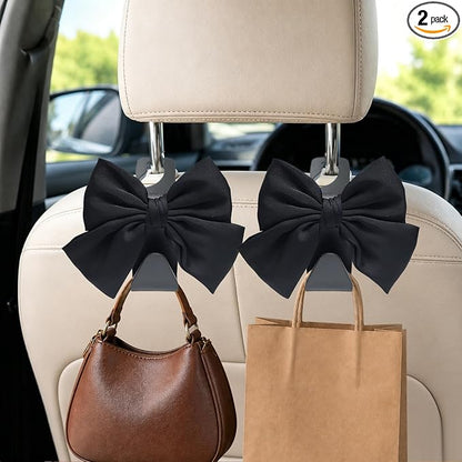 2-Pack Cute Bow Car Purse Hooks, Headrest Hangers, Black silk | Cute bow hooks keep purses and bags organized within reach while saving space; fits most car headrests by Unknown